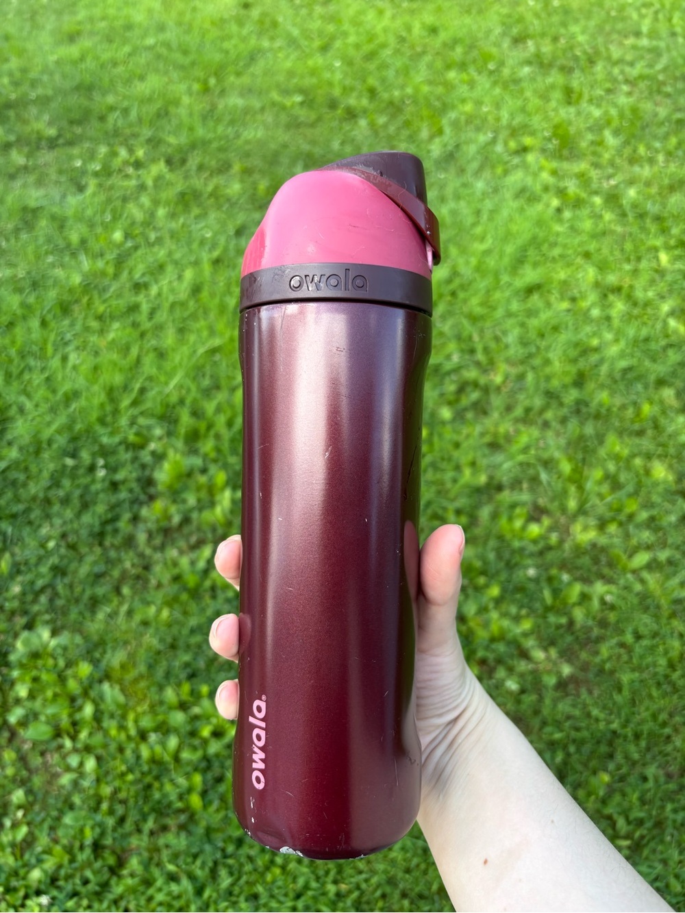 Owala Insulated Travel Bottle in Pink and Maroon